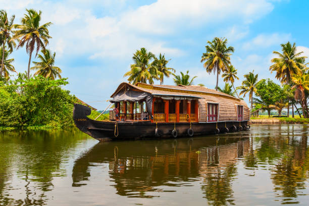 a houseboat sailing in alappuzha backwaters in kerala state in india